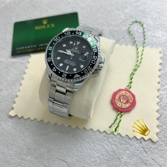 Rolex GMT Master II- Green Black Sides with Black Dial Silver Chain Watch